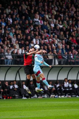 Eredivisie: NEC Nijmegen v Feyenoord Rotterdam Nijmegen - Philippe Sandler of NEC Nijmegen, Ayase Ueda of Feyenoord during the thirtieth competition round of the 2025 2026 Eredivisie season. The match is set between NEC Nijmegen and Feyenoord Rotterdam at Goffertstadion on 12 April 2026 in Nijmegen, The Netherlands. Copyright: xTomxBodex