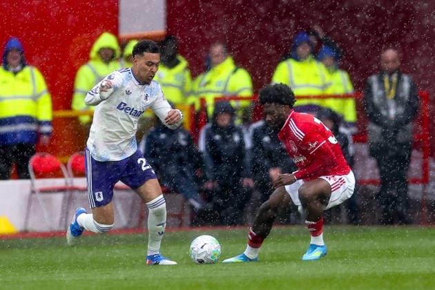 Nottingham Forest v Aston Villa, Premier League Morgan Rogers of Aston Villa looks to get past Ola Aina of Nottingham Forest during the Nottingham Forest v Aston Villa Premier League match at the City Ground, West Bridgford, England on 12 April 2026 Credit: Ryan Crockett Every Second Media Editorial use only. All images are copyright Every Second Media Limited. No images may be reproduced without prior permission. All rights reserved. Premier League and Football League images are subject to licensing agreements with Football DataCo Limited. see https: www.football-dataco.com Copyright: xIMAGO EveryxSecondxMediax ESM-1903-0019 RyanxCrockettx xEveryxSecondxMediax