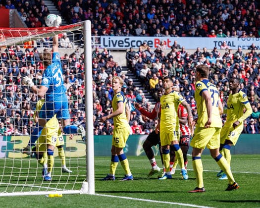 12th April 2026; Stadium of Light, Sunderland, England; Premier League Football, Sunderland versus Tottenham Hotspur; Tottenham Hotspur Antonin Kinsky tips cross over the bar WMxSportsxMedia