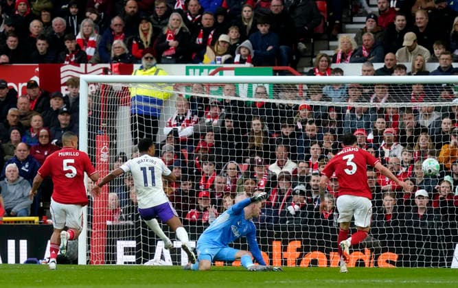 Nottingham, England, 12th April 2026. Matz Sels of Nottingham Forest saves from Ollie Watkins of Aston Villa during the Nottingham Forest vs Aston Villa Premier League match at the City Ground, Nottingham. Picture credit should read: Andrew Yates Sportimage EDITORIAL USE ONLY. No use with unauthorised audio, video, data, fixture lists, club league logos or live services. Online in-match use limited to 120 images, no video emulation. No use in betting, games or single club league player publications. SPI_023_AY_Forest_Villa SPI-4682-0023