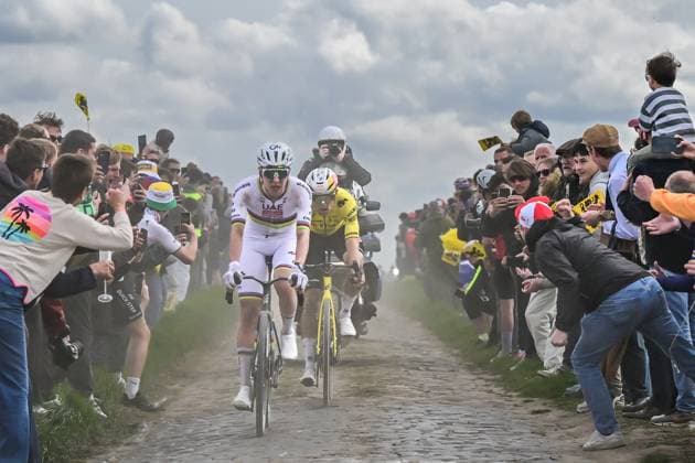 Belgian Wout van Aert of Team Visma-Lease a Bike and Slovenian Tadej Pogacar of UAE Team Emirates-XRG pictured in action during the men s Paris-Roubaix cycling race, Sunday 12 April 2026, around Roubaix, France. The 123rd edition of Paris-Roubaix cycling races will take on Sunday, with the women riding 143,1 km the men riding 258,3 km on Sunday. DIRKxWAEM  x170562992x