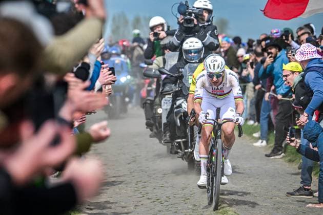 Belgian Wout van Aert of Team Visma-Lease a Bike and Slovenian Tadej Pogacar of UAE Team Emirates-XRG pictured in action during the men s Paris-Roubaix cycling race, Sunday 12 April 2026, around Roubaix, France. The 123rd edition of Paris-Roubaix cycling races will take on Sunday, with the women riding 143,1 km the men riding 258,3 km on Sunday. POOLxBERNARDxPAPON  x170564663x