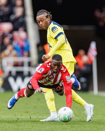 12th April 2026; Stadium of Light, Sunderland, England; Premier League Football, Sunderland versus Tottenham Hotspur; Destiny Udogie of Tottenham Hotspur battles with Nordi Mukiele of Sunderland WMxSportsxMedia