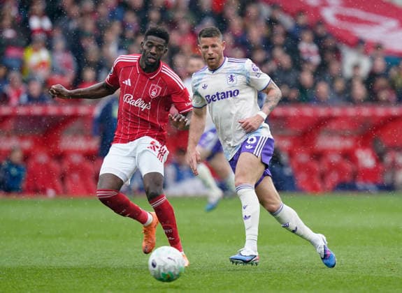 Nottingham, England, 12th April 2026. Murillo of Nottingham Forest tussles with Ross Barkley of Aston Villa during the Nottingham Forest vs Aston Villa Premier League match at the City Ground, Nottingham. Picture credit should read: Andrew Yates Sportimage EDITORIAL USE ONLY. No use with unauthorised audio, video, data, fixture lists, club league logos or live services. Online in-match use limited to 120 images, no video emulation. No use in betting, games or single club league player publications. SPI_037_AY_Forest_Villa SPI-4682-0037