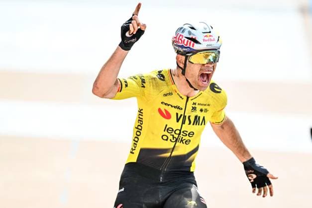 Belgian Wout van Aert of Team Visma-Lease a Bike celebrates as he crosses the finish line to win the men s Paris-Roubaix cycling race, Sunday 12 April 2026, around Roubaix, France. The 123rd edition of Paris-Roubaix cycling races will take on Sunday, with the women riding 143,1 km the men riding 258,3 km on Sunday. JASPERxJACOBS  x170566321x