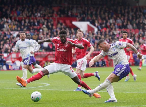 Nottingham, England, 12th April 2026. Ross Barkley of Aston Villa shoots during the Nottingham Forest vs Aston Villa Premier League match at the City Ground, Nottingham. Picture credit should read: Andrew Yates Sportimage EDITORIAL USE ONLY. No use with unauthorised audio, video, data, fixture lists, club league logos or live services. Online in-match use limited to 120 images, no video emulation. No use in betting, games or single club league player publications. SPI_044_AY_Forest_Villa SPI-4682-0044