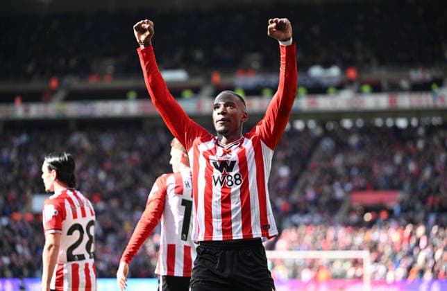 Nordi Mukiele of Sunderland scores the opening goal with a massive deflection off Cristian Romero of Tottenham Hotspur and celebrates Sunderland v Tottenham Hotspur, Premier League, Football, Stadium of Light, Sunderland, UK - 12 Apr 2026Sunderland Stadium of Light United Kingdom EDITORIAL USE ONLY No use with unauthorised audio, video, data, fixture lists, club league logos or live services. Online in-match use limited to 120 images, no video emulation. No use in betting, games or single club league player publications. Copyright: xGreigxCowie Shutterstockx 16823609ah