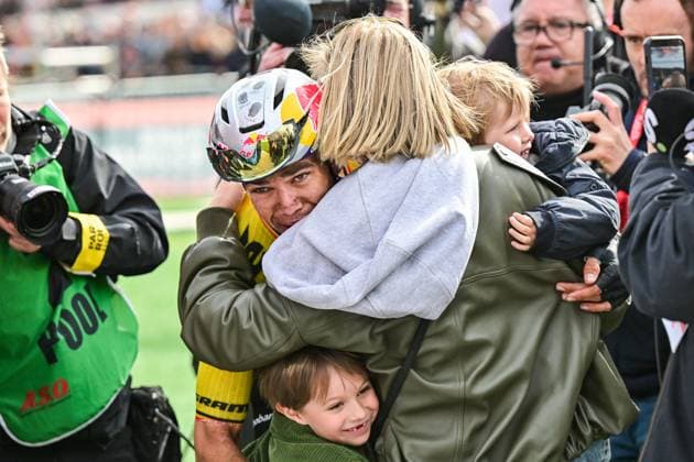Wout van Aert of Team Visma-Lease a Bike, his wife Sarah De Bie and his sons Georges and Jerome celebrates after winning the men s Paris-Roubaix cycling race, Sunday 12 April 2026, around Roubaix, France. The 123rd edition of Paris-Roubaix cycling races will take on Sunday, with the women riding 143,1 km the men riding 258,3 km on Sunday. DIRKxWAEM  x170567671x