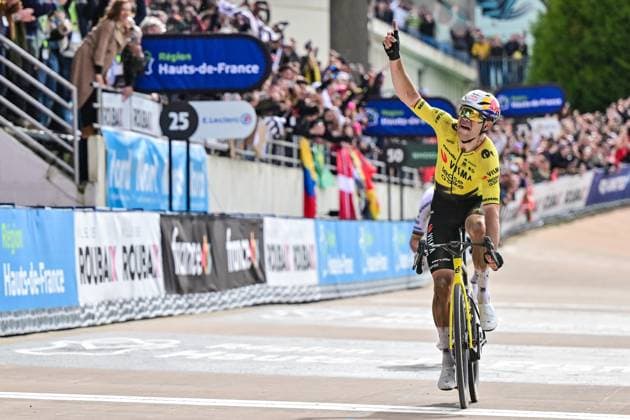 Belgian Wout van Aert of Team Visma-Lease a Bike celebrates as he crosses the finish line to win the men s Paris-Roubaix cycling race, Sunday 12 April 2026, around Roubaix, France. The 123rd edition of Paris-Roubaix cycling races will take on Sunday, with the women riding 143,1 km the men riding 258,3 km on Sunday. DIRKxWAEM  x170568376x