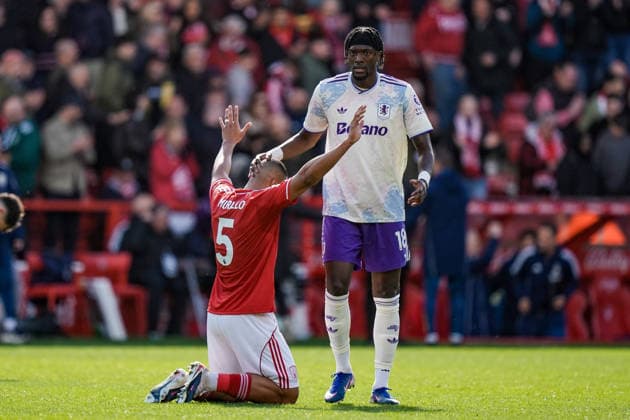Premier League: Nottingham Forest v Aston Villa Tammy Abraham of Aston Villa prays for Murillo of Nottingham Forest at full time during the Premier League match Nottingham Forest vs Aston Villa at City Ground, Nottingham, United Kingdom on 12 April 2026 (Photo by Maynard Manyowa News Images) Nottingham City Ground Nottinghamshire United Kingdom Copyright: xMaynardxManyowa NewsxImagesx