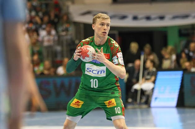 12.04.2026, xgox, Handball - Daikin HBL SC Magdeburg - HC Erlangen emspor, v.l. Gisli Thorgeir Kristjansson (Magdeburg, 10) am Ball, plays the ball Magdeburg
