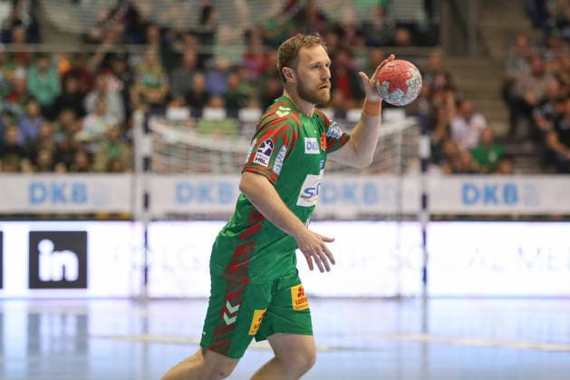 12.04.2026, xgox, Handball - Daikin HBL SC Magdeburg - HC Erlangen emspor, v.l. Albin Lagergren (Magdeburg, 21) am Ball, plays the ball Magdeburg