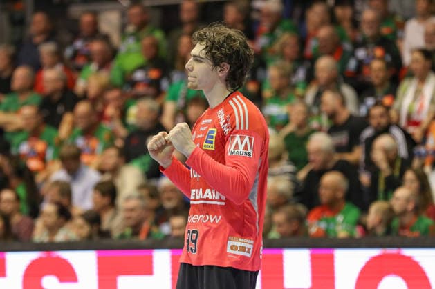 12.04.2026, xgox, Handball - Daikin HBL SC Magdeburg - HC Erlangen emspor, v.l. Tin Herceg (Erlangen, 99) Jubelt ueber gehaltenen Ball, abgewehrt, gehalten, Torhueter Magdeburg