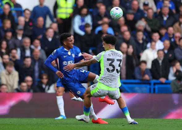 12th April 2026; Stamford Bridge, Chelsea, London, England: Premier League Football, Chelsea versus Manchester City; Estevao of Chelsea under pressure from Nico O Reilly of Manchester City JPxFletcher