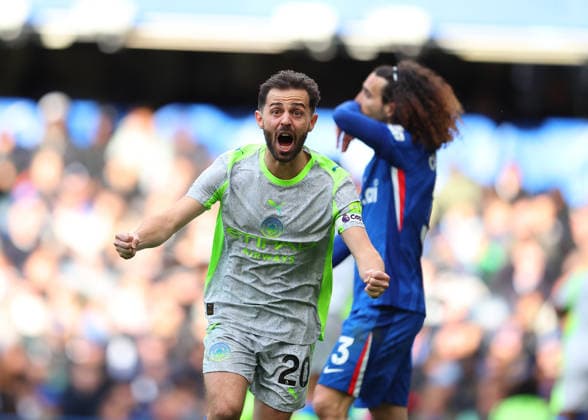 12th April 2026; Stamford Bridge, Chelsea, London, England: Premier League Football, Chelsea versus Manchester City; Bernardo Silva of Manchester City celebrates immediately after Marc Guehi of Manchester City scored his sides 2nd goal in the 57th minute to make it 2-0 JPxFletcher