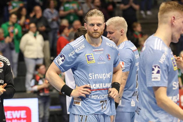 12.04.2026, xgox, Handball - Daikin HBL SC Magdeburg - HC Erlangen emspor, v.l. Maciej Gebala (Erlangen, 77) enttaeuscht, schaut enttaeuscht, niedergeschlagen, disappointed Magdeburg