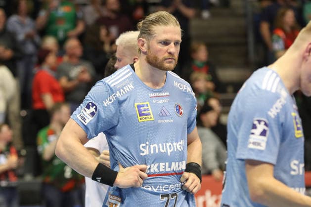 12.04.2026, xgox, Handball - Daikin HBL SC Magdeburg - HC Erlangen emspor, v.l. Maciej Gebala (Erlangen, 77) enttaeuscht, schaut enttaeuscht, niedergeschlagen, disappointed Magdeburg