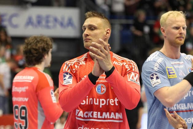 12.04.2026, xgox, Handball - Daikin HBL SC Magdeburg - HC Erlangen emspor, v.l. Dario Quenstedt (Erlangen, 1) enttaeuscht, schaut enttaeuscht, niedergeschlagen, disappointed Magdeburg