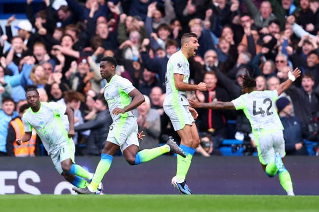 London, England, 12th April 2026. Marc Guehi of Manchester City celebrates after scoring to make it 2-0 during the Chelsea vs Manchester City Premier League match at Stamford Bridge, London. Picture credit should read: Paul Terry Sportimage EDITORIAL USE ONLY. No use with unauthorised audio, video, data, fixture lists, club league logos or live services. Online in-match use limited to 120 images, no video emulation. No use in betting, games or single club league player publications. SPI_056_PT_Chelsea_Man_City SPI-4683-0056