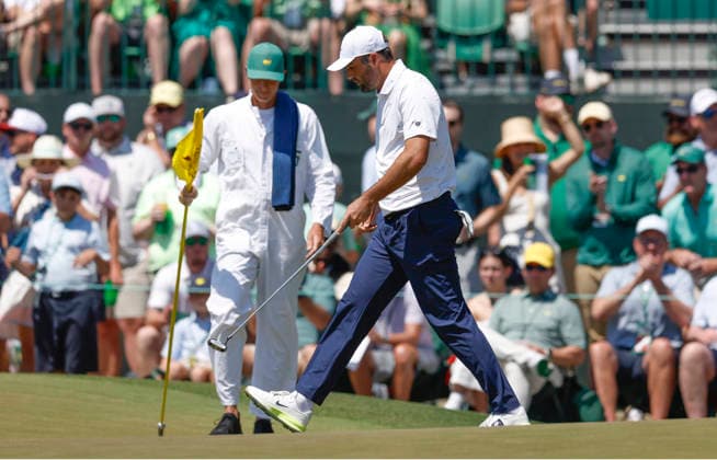 Scottie Scheffler sinks a birdie putt on the 1st hole during the final round of the Masters Tournament at Augusta National Golf Club on Sunday, April 12, 2026, in Augusta, Georgia.  AUG20260412803 JOHNxANGELILLO