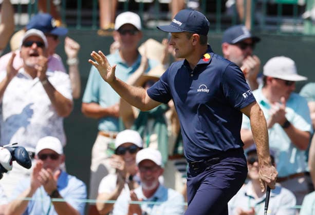 Justin Rose of England reacts after chipping in for a birdie on the 1st hole during the final round of the Masters Tournament at Augusta National Golf Club on Sunday, April 12, 2026, in Augusta, Georgia.  AUG20260412808 JOHNxANGELILLO