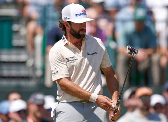 Cameron Young putts for par on the 1st hole during the final round of the Masters Tournament at Augusta National Golf Club on Sunday, April 12, 2026, in Augusta, Georgia.  AUG20260412815 JOHNxANGELILLO