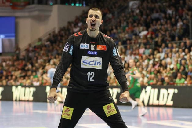 12.04.2026, xgox, Handball - Daikin HBL SC Magdeburg - HC Erlangen emspor, v.l. Matej Mandic (Magdeburg, 12) Jubelt ueber gehaltenen Ball, abgewehrt, gehalten, Torhueter Magdeburg