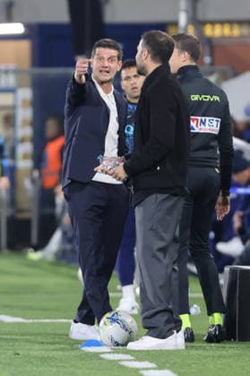 Inter Milan™s head coach Cristian Chivu and Como™s head coach Cesc Fabregas during the Serie A soccer match between Como and Inter at the Giuseppe Sinigaglia stadium in Como, north Italy - April 12, 2026 - Soccer.  Copyright: xAntonioxSaiai LaPressex