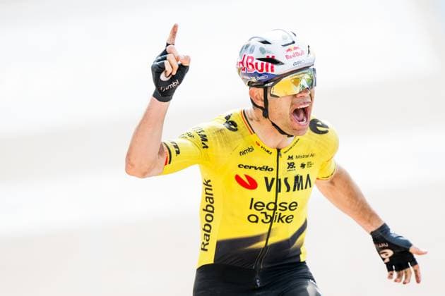 Belgian Wout van Aert of Team Visma-Lease a Bike celebrates as he crosses the finish line to win the men s Paris-Roubaix cycling race, Sunday 12 April 2026, around Roubaix, France. The 123rd edition of Paris-Roubaix cycling races will take on Sunday, with the women riding 143,1 km the men riding 258,3 km on Sunday. JASPERxJACOBS  x170603308x