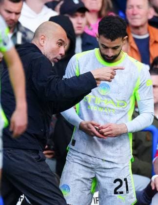 Manchester City Manager Pep Guardiola issues instructions to Rayan AÃ¯t-Nouri Chelsea v Manchester City, Premier League, Football, Stamford Bridge, London, UK - 12 Apr 2026London Stamford Bridge United Kingdom EDITORIAL USE ONLY No use with unauthorised audio, video, data, fixture lists, club league logos or live services. Online in-match use limited to 120 images, no video emulation. No use in betting, games or single club league player publications.  Copyright: xJavierxGarcia Shutterstockx 16823620cd