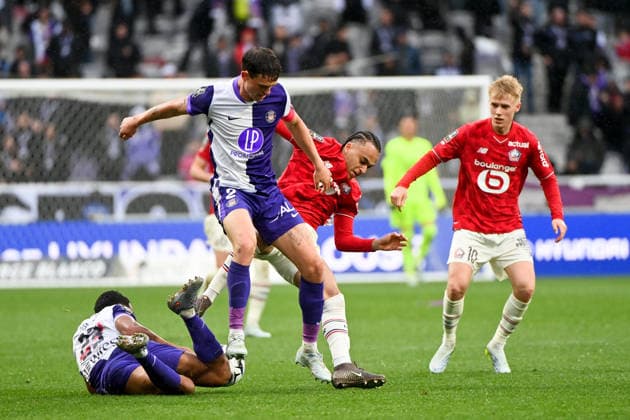 Toulouse FC v Lille OSC - Ligue 1 McDonald s 2025 2026 08 Ethan MBAPPE (losc) - 02 Rasmus Schmidt NICOLAISEN (tfc) during the Ligue 1 McDonald s match between Toulouse and Lille at Stadium de Toulouse on April 12, 2026 in Toulouse, France. Toulouse France  Copyright: xFEPx 776348348