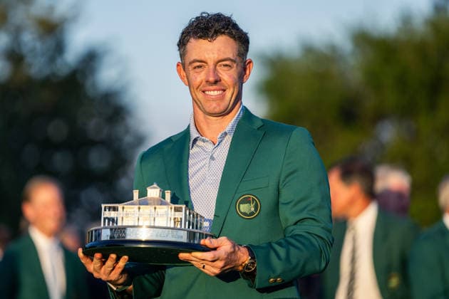 260412 Rory McIlroy of Northern Ireland celebrates with the Masters trophy during the Green Jacket Ceremony after winning the 2026 Masters Golf Tournament on April 12, 2026 in Augusta. Photo: Petter Arvidson BILDBYRAN kod PA PA1196 golf masters bbeng the masters augusta jubel Copyright: PETTERxARVIDSON BB260412PA278