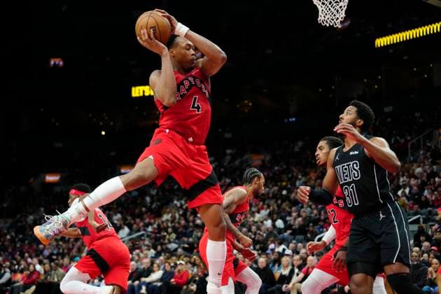 April 12, 2026, Toronto, On, CANADA: Toronto Raptors forward Scottie Barnes (4) grabs the rebound in front of Brooklyn Nets forward Chaney Johnson (31) during second half NBA, Basketball Herren, USA basketball action in Toronto, Sunday, April 12, 2026. Canada News - April 12, 2026 - ZUMAc35_ 20260412_zaf_c35_067 Copyright: xFrankxGunnx