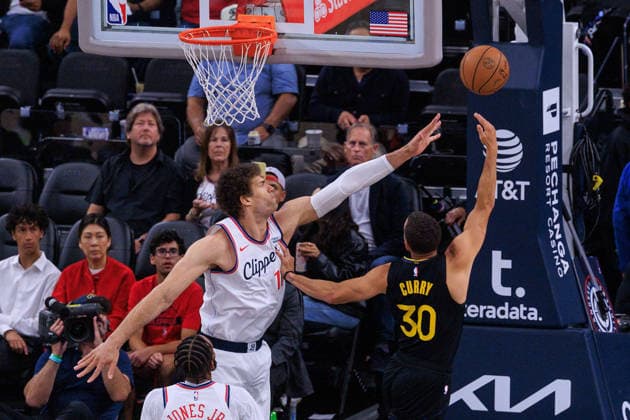 April 12, 2026, Inglewood, California, USA: Stephen Curry 30 of the Golden State Warriors puts up a shot over Brook Lopez 11 of the LA Clippers during a regular season NBA, Basketball Herren, USA game on Sunday April 12, 2026 at Intuit Dome Arena in Inglewood, California. Clippers defeat Warriors, 115-110. JAVIER ROJAS PI Inglewood USA - ZUMAp124 20260412_zaa_p124_097 Copyright: xJavierxRojasx