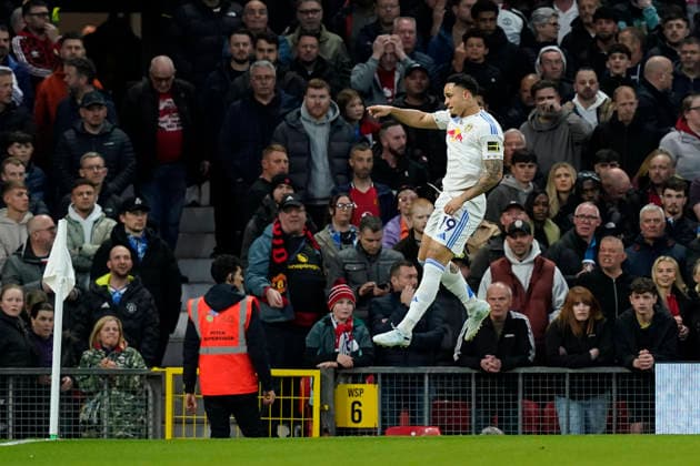 Manchester, England, 13th April 2026. Noah Okafor of Leeds United celebrates after scoring to make it 1-0 during the Manchester United, ManU vs Leeds United Premier League match at Old Trafford, Manchester. Picture credit should read: Andrew Yates Sportimage EDITORIAL USE ONLY. No use with unauthorised audio, video, data, fixture lists, club league logos or live services. Online in-match use limited to 120 images, no video emulation. No use in betting, games or single club league player publications. SPI_022_AY_Man_Utd_Leeds SPI-4684-0022