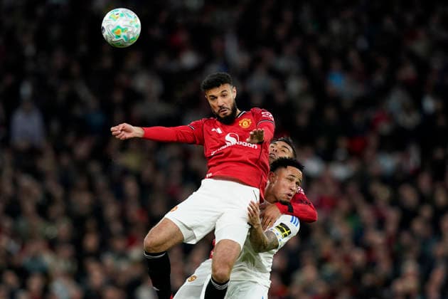 Manchester, England, 13th April 2026. Noussair Mazraoui (L) and Casemiro of Manchester United, ManU challenge Noah Okafor of Leeds United for the ball during the Manchester United vs Leeds United Premier League match at Old Trafford, Manchester. Picture credit should read: Andrew Yates Sportimage EDITORIAL USE ONLY. No use with unauthorised audio, video, data, fixture lists, club league logos or live services. Online in-match use limited to 120 images, no video emulation. No use in betting, games or single club league player publications. SPI_033_AY_Man_Utd_Leeds SPI-4684-0033