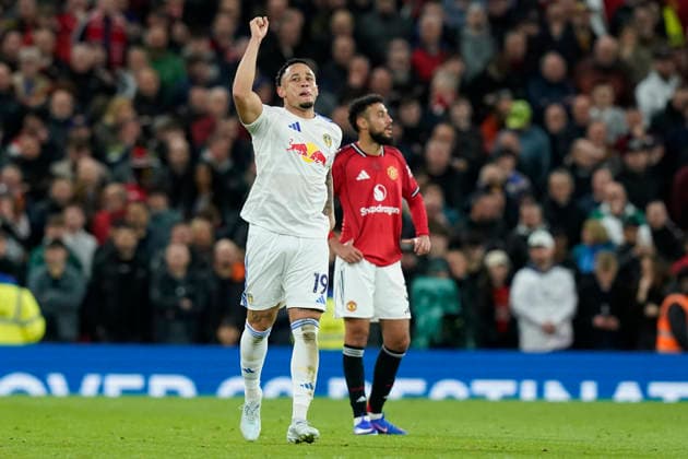 Manchester, England, 13th April 2026. Noah Okafor of Leeds United celebrates after scoring to make it 2-0 during the Manchester United, ManU vs Leeds United Premier League match at Old Trafford, Manchester. Picture credit should read: Andrew Yates Sportimage EDITORIAL USE ONLY. No use with unauthorised audio, video, data, fixture lists, club league logos or live services. Online in-match use limited to 120 images, no video emulation. No use in betting, games or single club league player publications. SPI_039_AY_Man_Utd_Leeds SPI-4684-0039