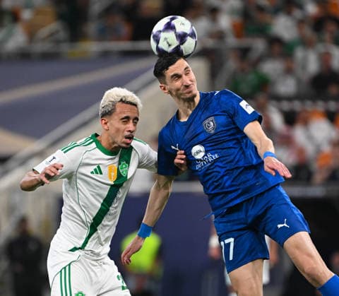 JEDDAH, SAUDI ARABIA - April 13: Matheus Goncalves of Al Ahli Strong challenge with Youssouf Sabaly during the AFC Champions League Elite Round of 16 match between Al Ahli and Al Duhail at King Abdullah Sports City on April 13, 2026 in Jeddah, Saudi Arabia.