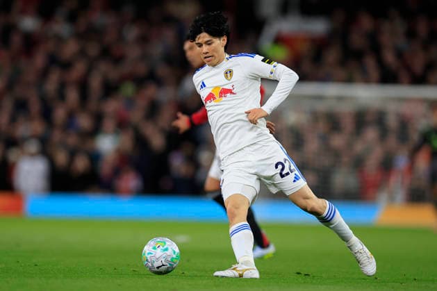 Manchester United, ManU v Leeds United, Premier League Ao Tanaka (22) of Leeds United controls the ball during the Premier League match between Manchester United and Leeds United at Old Trafford, Manchester, UK on 13 April 2026. Manchester Old Trafford Greater Manchester UK Editorial use only DataCo restrictions apply See www.football-dataco.com , Copyright: xConorxMolloyx PSI-24063-0065
