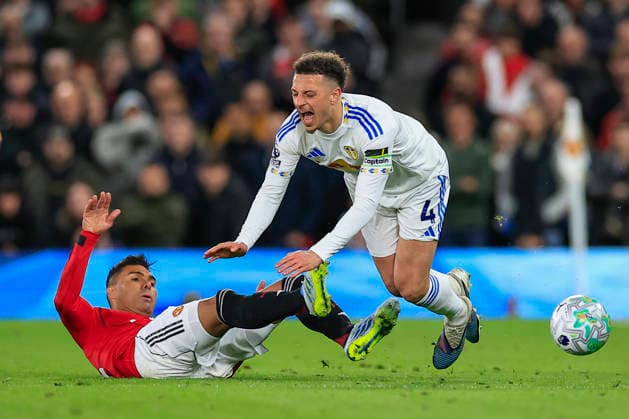 Manchester United, ManU v Leeds United, Premier League Casemiro (18) of Manchester United fouls Ethan Ampadu (4) of Leeds United during the Premier League match between Manchester United and Leeds United at Old Trafford, Manchester, UK on 13 April 2026. Manchester Old Trafford Greater Manchester UK Editorial use only DataCo restrictions apply See www.football-dataco.com , Copyright: xConorxMolloyx PSI-24063-0074