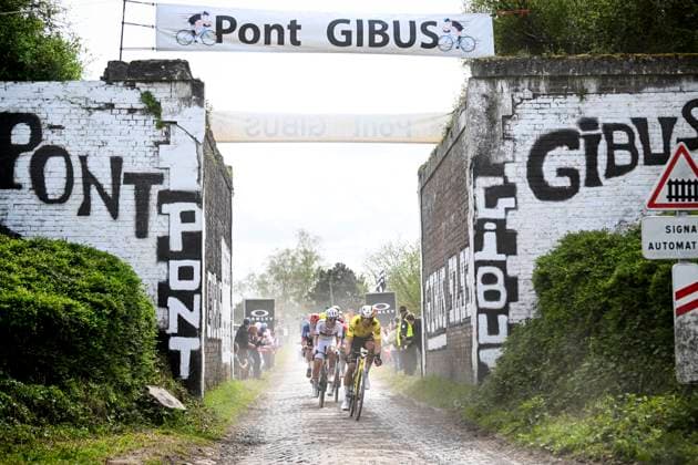 Paris - Roubaix Hauts-de-France 2026 Cycling Race ROUBAIX, FRANCE - APRIL 12 : Pogacar Tadej (SLO) of UAE Team Emirates XRG, Van Aert Wout (BEL) of Team Visma Lease a Bike during the 123rd edition of Paris - Roubaix Hauts-de-France an UCI World Tour 1.UWT one day cycling road race for Men Elite of 258 km with start in Compiegne and finish in Roubaix on April 12, 2026 in Roubaix, France, 12 04 2026 ( Motordriver Kenny Verfaillie - Roubaix France  Copyright: xVincentxKalutx