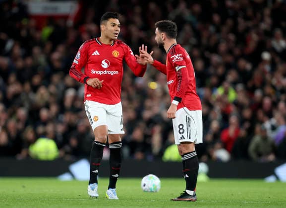 Manchester United, ManU v Leeds United - Premier League Casemiro of Manchester United and Bruno Fernandes of Manchester United celebrate goal during the Premier League match between Manchester United and Leeds United at Old Trafford on April 13, 2026 in Manchester, England. Manchester Old Trafford England United Kingdom Copyright: xAllstarxPicturexLibraryxLtdx