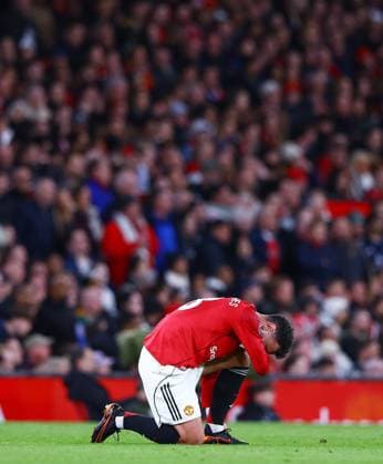 Bruno Fernandes of Manchester United, ManU appears to be injured as Leeds United score their second goal 0-2 Manchester United v Leeds United, Premier League, Football, Old Trafford, Manchester, UK - 13 Apr 2026Manchester Old Trafford United Kingdom EDITORIAL USE ONLY No use with unauthorised audio, video, data, fixture lists, club league logos or live services. Online in-match use limited to 120 images, no video emulation. No use in betting, games or single club league player publications. Copyright: xMattxWest Shutterstockx 16827177x