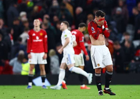 Bruno Fernandes of Manchester United, ManU looks dejected at the end of the match Manchester United v Leeds United, Premier League, Football, Old Trafford, Manchester, UK - 13 Apr 2026Manchester Old Trafford United Kingdom EDITORIAL USE ONLY No use with unauthorised audio, video, data, fixture lists, club league logos or live services. Online in-match use limited to 120 images, no video emulation. No use in betting, games or single club league player publications.  Copyright: xMattxWest Shutterstockx 16827177ba