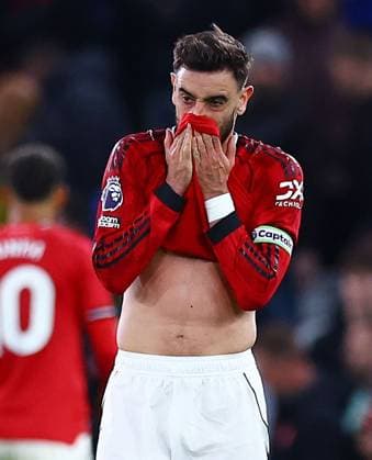 Bruno Fernandes of Manchester United, ManU looks dejected at the end of the match Manchester United v Leeds United, Premier League, Football, Old Trafford, Manchester, UK - 13 Apr 2026Manchester Old Trafford United Kingdom EDITORIAL USE ONLY No use with unauthorised audio, video, data, fixture lists, club league logos or live services. Online in-match use limited to 120 images, no video emulation. No use in betting, games or single club league player publications.  Copyright: xMattxWest Shutterstockx 16827177bc