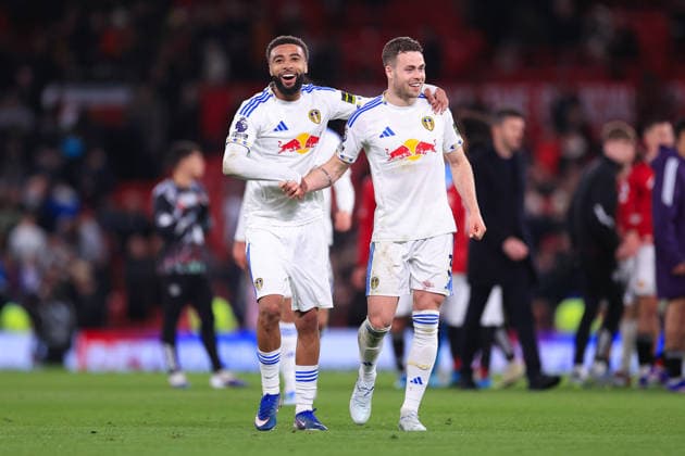 Football - Premier League - Manchester United, ManU v Leeds United 13th April 2026 - Premier League - Manchester United v Leeds United - Jayden Bogle of Leeds United (L) and Gabriel Gudmundsson of Leeds United celebrate after the match - Photo: Simon Stacpoole Offside. Manchester UK Copyright: xSimonxStacpoolexOffside