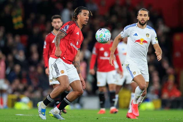 Manchester United, ManU v Leeds United, Premier League Leny Yoro (15) of Manchester United controls the ball watched by Dominic Calvert-Lewin (9) of Leeds United during the Premier League match between Manchester United and Leeds United at Old Trafford, Manchester, UK on 13 April 2026. Manchester Old Trafford Greater Manchester UK Editorial use only DataCo restrictions apply See www.football-dataco.com , Copyright: xConorxMolloyx PSI-24063-0107