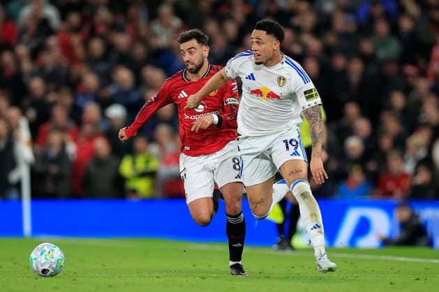 Manchester United, ManU v Leeds United, Premier League Noah Okafor (19) of Leeds United is challenged by Bruno Fernandes (8) of Manchester United during the Premier League match between Manchester United and Leeds United at Old Trafford, Manchester, UK on 13 April 2026. Manchester Old Trafford Greater Manchester UK Editorial use only DataCo restrictions apply See www.football-dataco.com , Copyright: xConorxMolloyx PSI-24063-0124