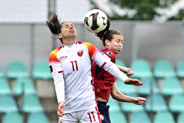L-R Armisa Kuc (Montenegro) and Antonie Starova (Czechia) in action during the European qualifying part for 2027 Women s Football World Cup match, group B1: Czechia vs Montenegro, in Prague, Czech Republic, on April 14, 2026. (CTKxPhoto OndrejxHajek) CTKPhotoP2026041407298  CTKPhotoP2026041407298