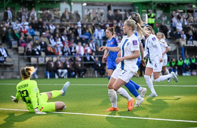 Adelina Engman of Finland scores the team s second goal past goalkeeper Maria Korenciova of Slovakia during the UEFA Women s football World Cup League B Group B3 qualification match between Finland and Slovakia in Helsinki, Finland on April 14, 2026. - MARKKU ULANDER Helsinki Finland X7CK-YfwWx0  Copyright: xMarkkuxUlanderx X7CK-YfwWx0